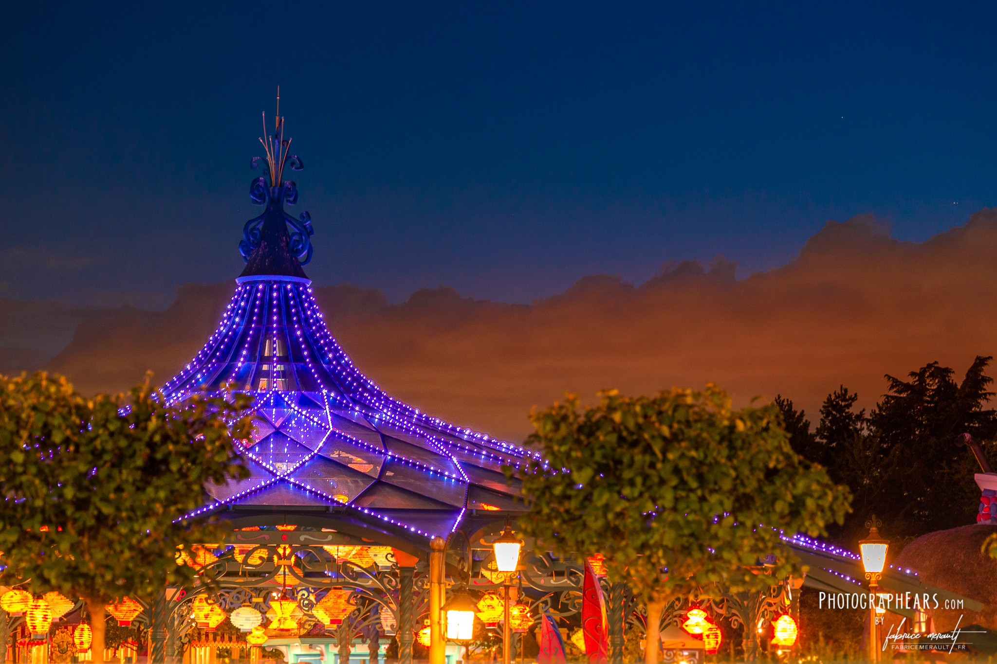 Mad Hatter's Tea Cups by night